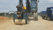 bucket roller compactor